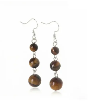 Aretes de plata con ojo de tigre natural y profundidad cálida. Una joya de carácter equilibrado.